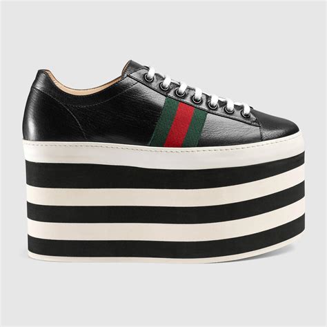 gucci negro tenis|tenis gucci platform.